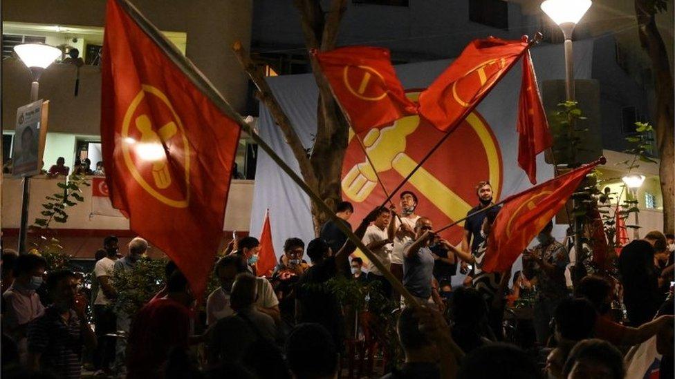 Supporters of the Workers' Party celebrate on the streets of Singapore. Photo: 11 July 2020