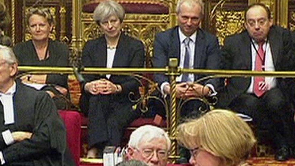 Theresa May watches the debate