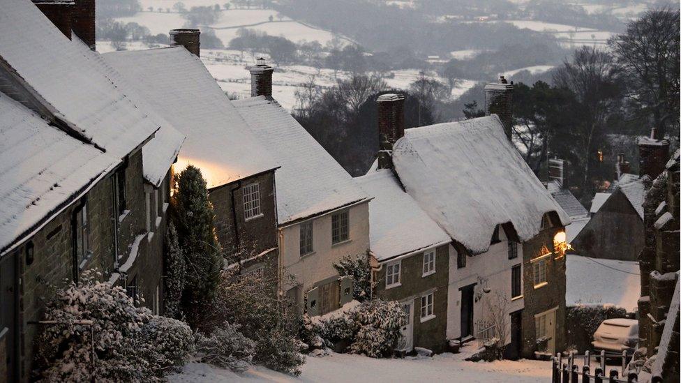 White rooftops were seen in Gold Hill, Dorset.