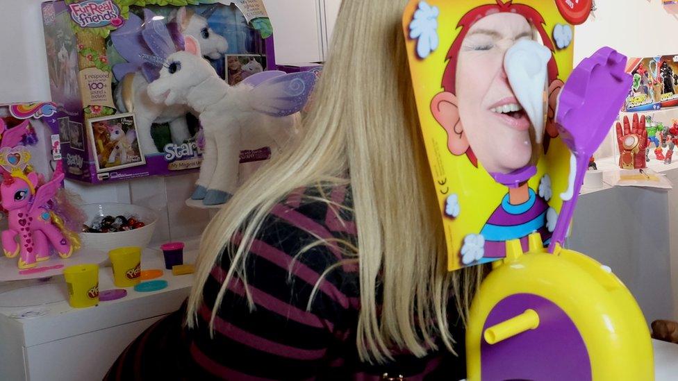 A women demonstrates Hasbro's Pie Face Game