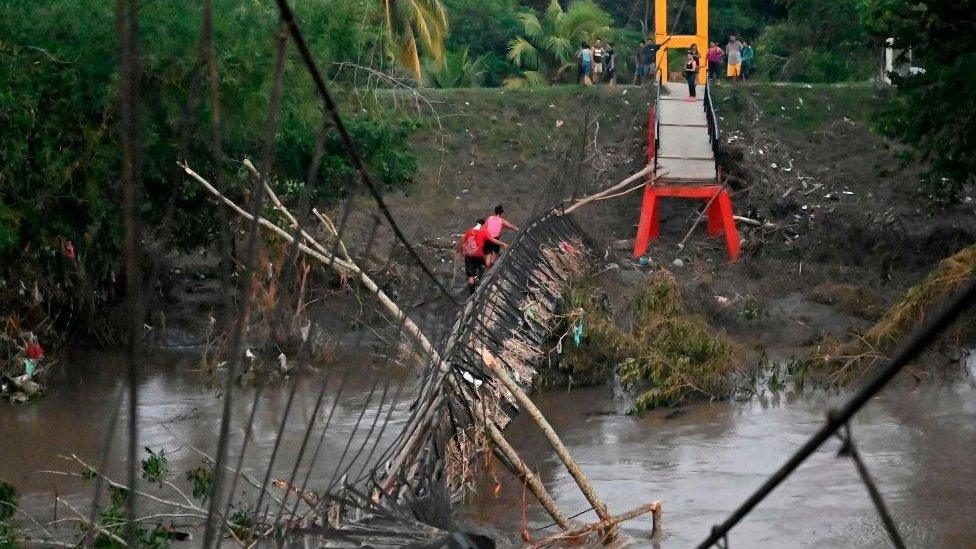 Damaged pedestrian bridge in Choloma, Honduras, on 10 November 2020