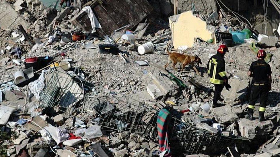 Rescuers in rubble, 7 Jul 17