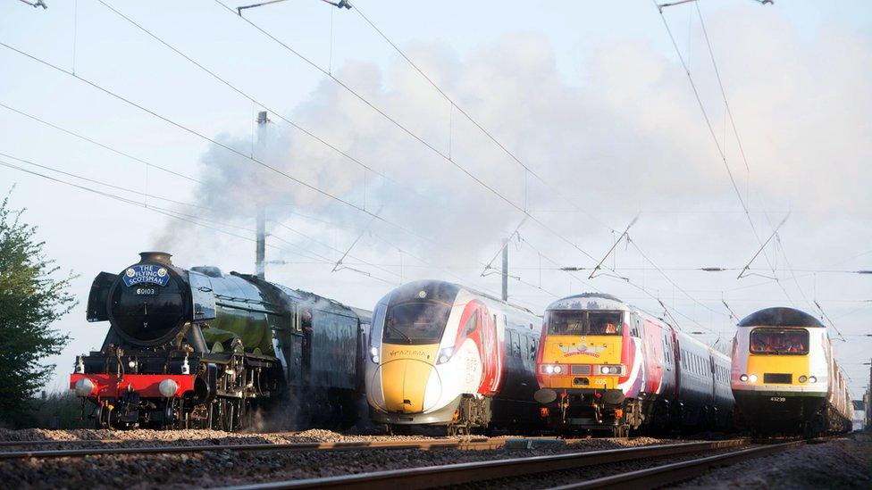 The Flying Scotsman and Virgin Trains' new Azuma travel in the same direction alongside two of the rail operator's present day fleet