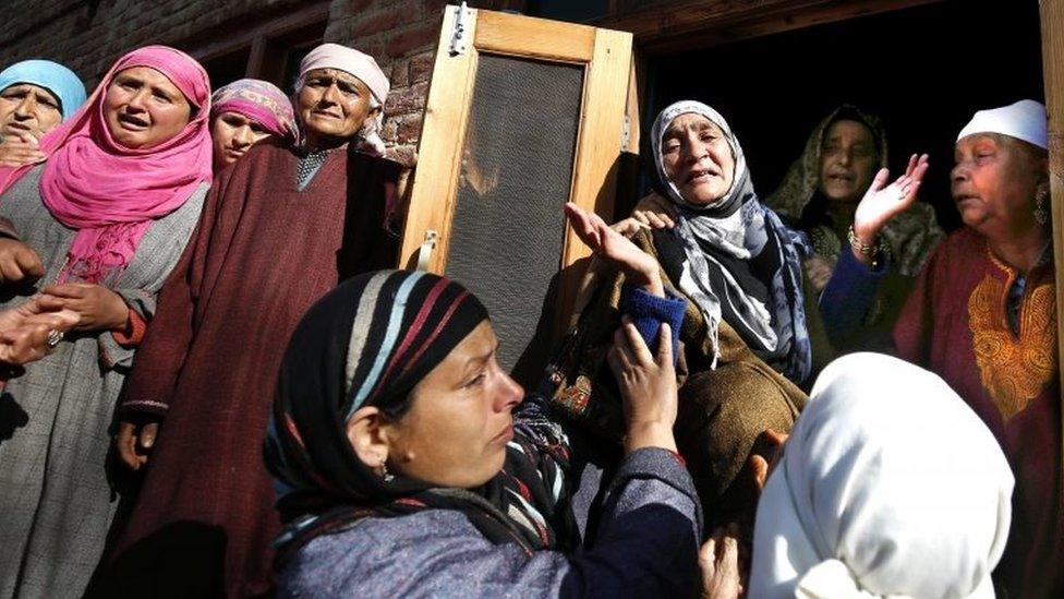 Women wail and mourn during the funeral procession of Raja Begum in Langate near Handwara, 75 kilometers north of Srinagar, the summer capital of Indian Kashmir, 13 April 2016.