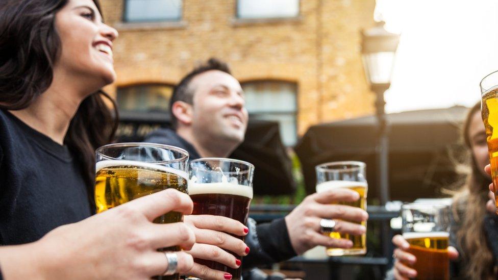 People drinking in a beer garden