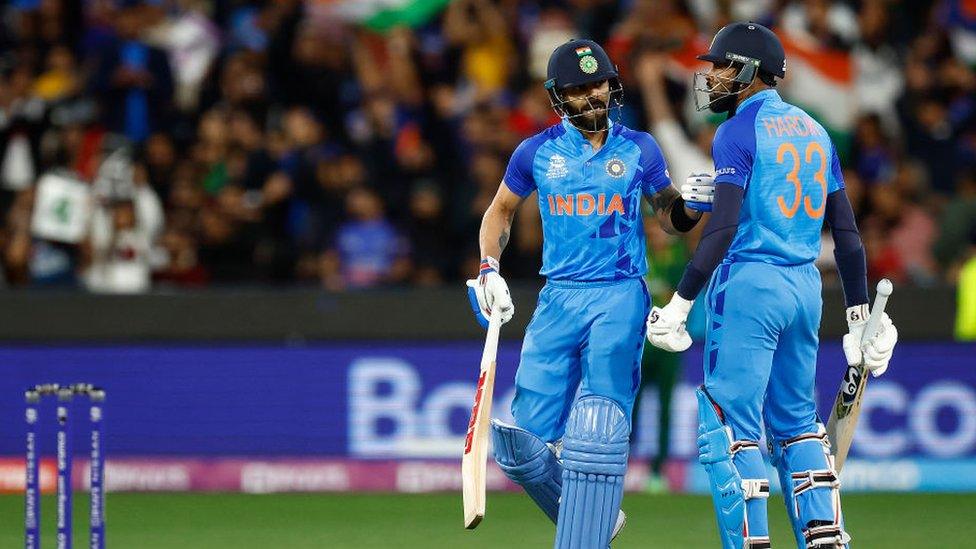 Virat Kohli and Hardik Pandya of India at the ICC Men's T20 World Cup match between India and Pakistan at Melbourne Cricket Ground on October 23, 2022