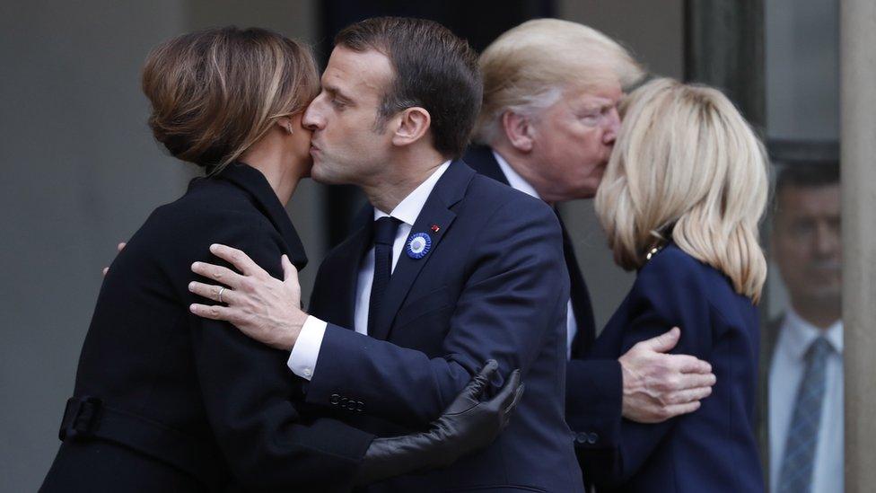 French President Emmanuel Macron and French First Lady Brigitte Macron greet US President Donald Trump and US First Lady Melania Trump.