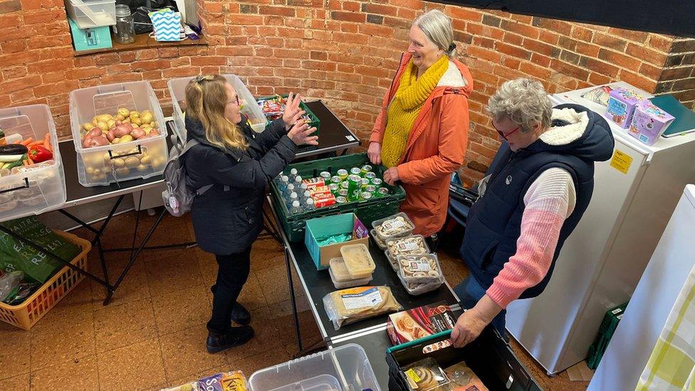 Volunteers hand out food at Melksham Community Larder