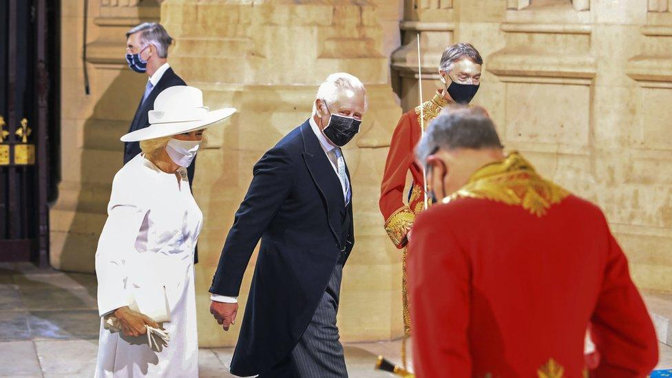 The Prince of Wales and Duchess of Cornwall arrive at the Sovereign"s Entrance to the Palace of Westminster ahead of Queen Elizabeth II for the Queen's Speech on 11 May 2021