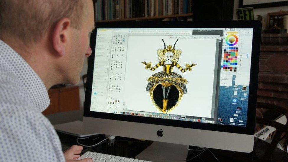 Tim-Simpson-designing-the-Queen-Bee-outfit.