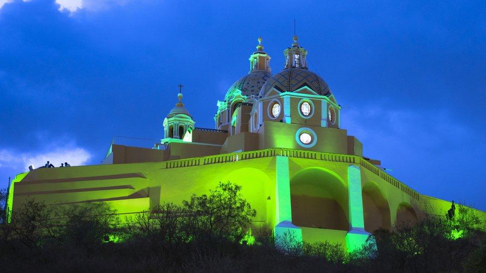 Iglesia de Nuestra Señora De Los Remedios, Cholula, Mexico joins in the 'global greening' for Saint Patrick's Day festivities.