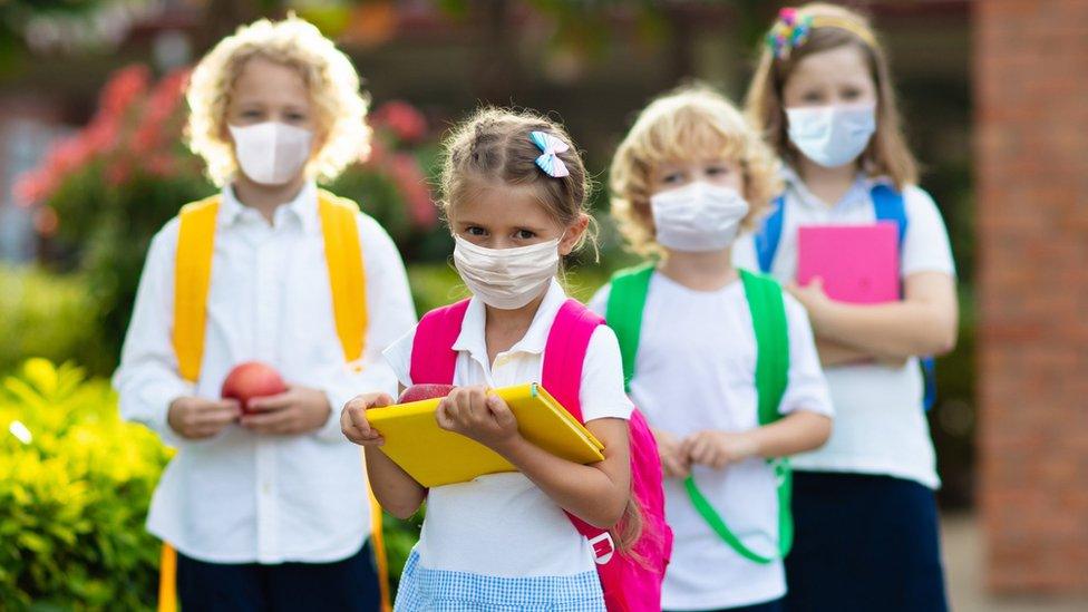 School children in face masks