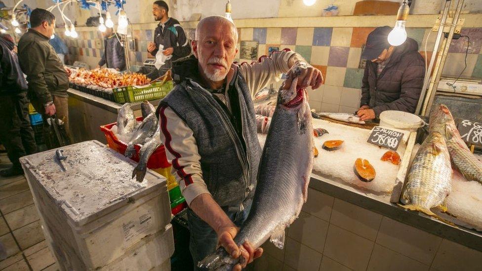 People do shopping during the first day of holy Islamic fasting month of Ramadan at central market area in Tunis, Tunisia on April 02, 2022