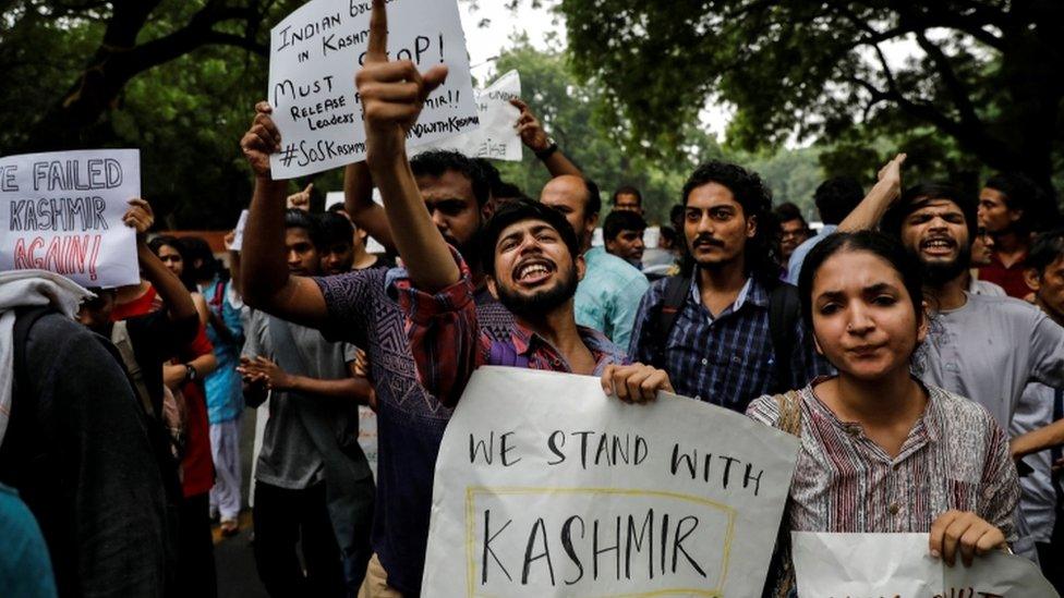 Opponents of the move protest in Delhi