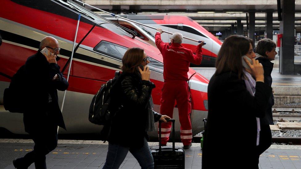 Passengers at the Termini railway station in Rome