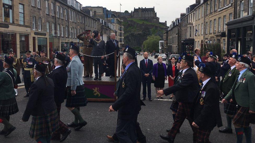 servicemen and women march through central Edinburgh for the annual Armed Forces Day