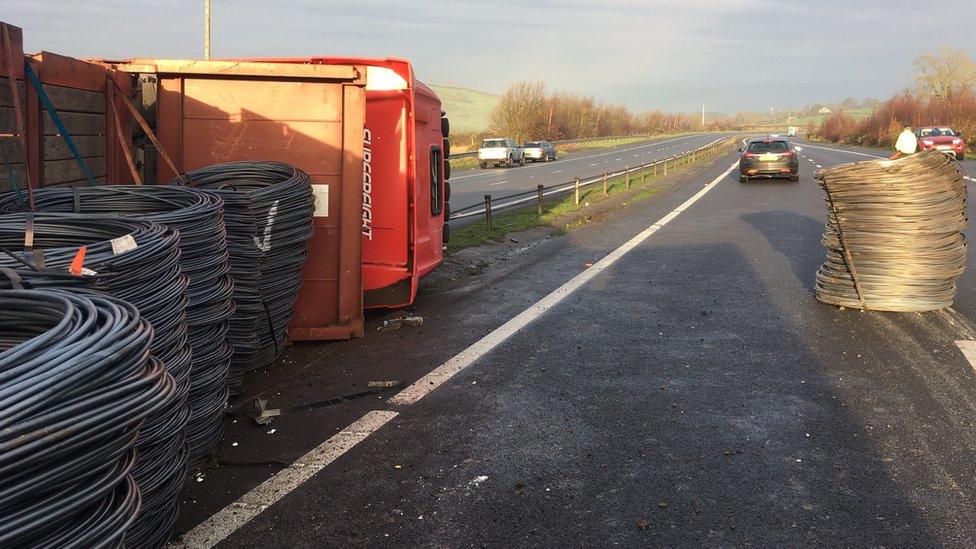 A lorry on its side on the A1