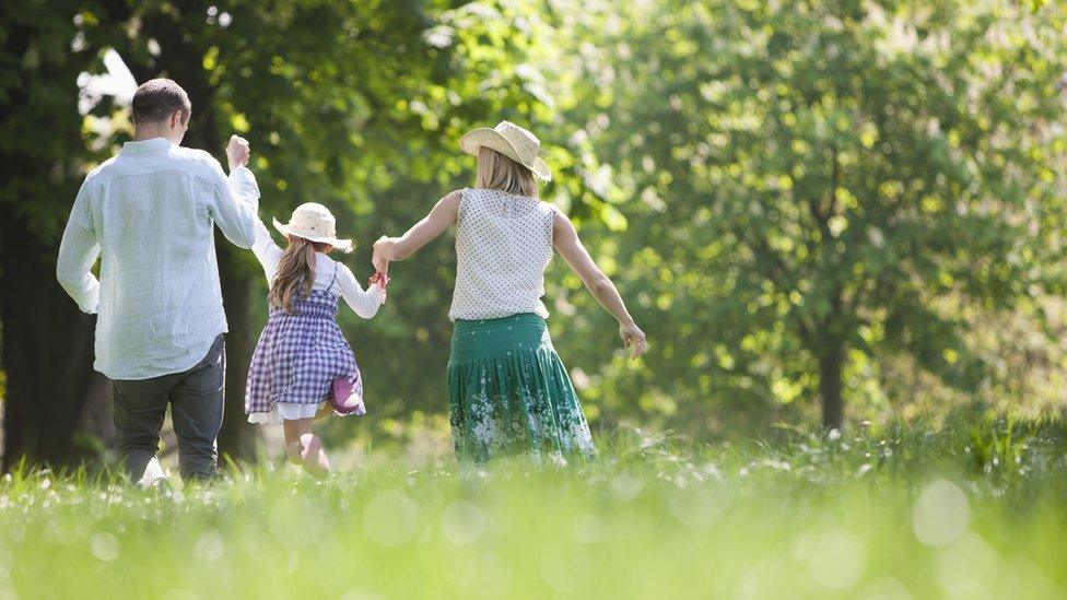 A-family-playing-in-a-park.