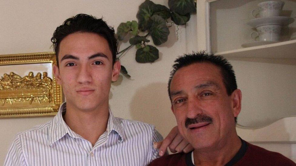 Luis Mercado and his great-uncle Ruben standing next to each other