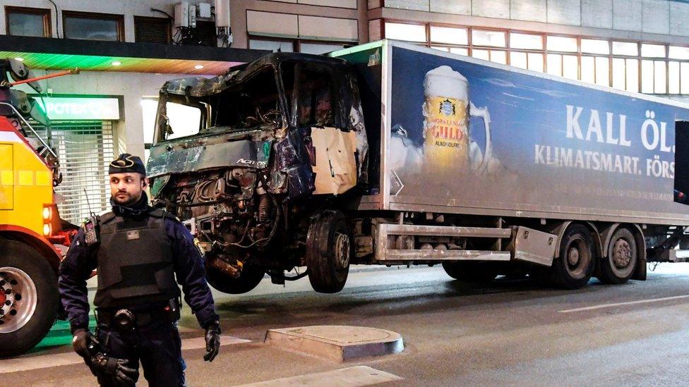 This picture taken on April 8, 2017, shows the truck that crashed into the Ahlens department store at Drottninggatan in central Stockholm the day before