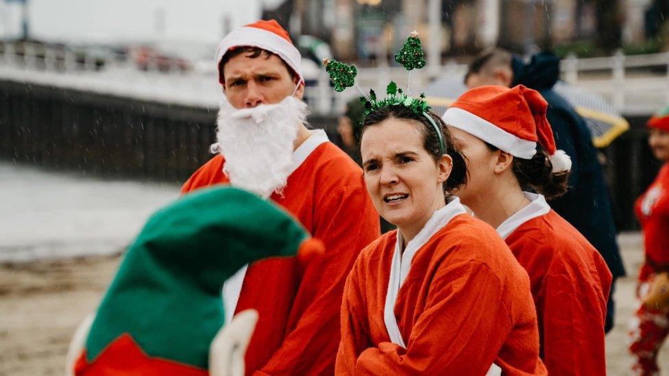 Woman in santa suit