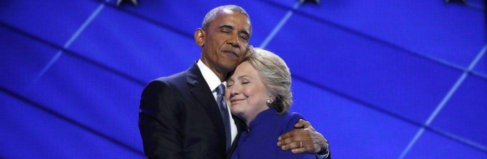 US President Barack Obama greets Democratic presidential nominee Hillary Clinton at the end of the third day of the Democratic convention.