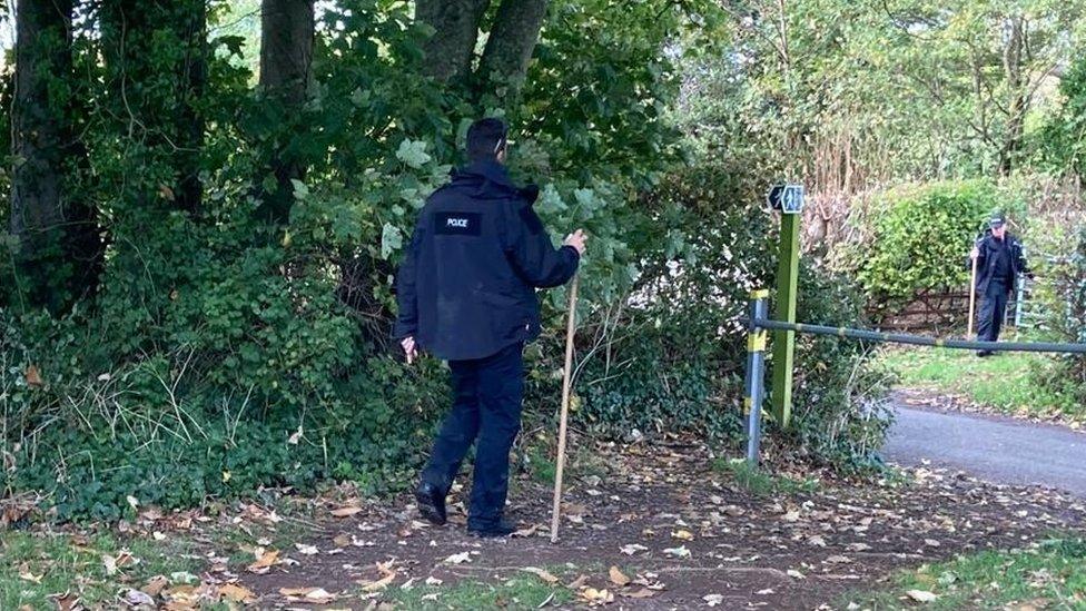 Officers searching local hedgerows