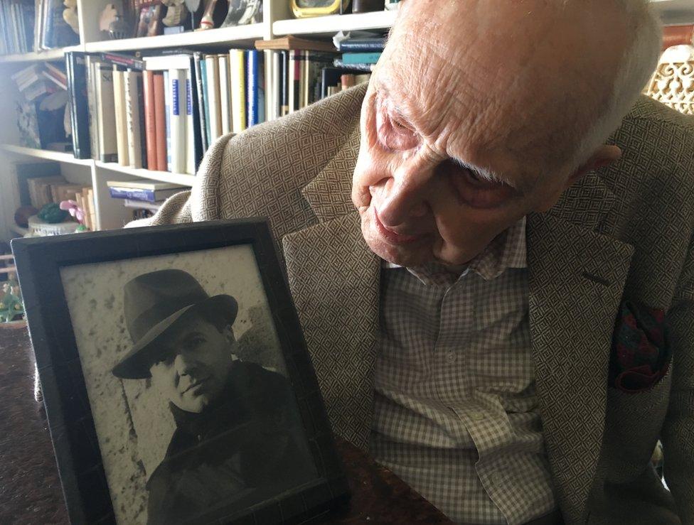 Daniel Cordier with a picture of Jean Moulin