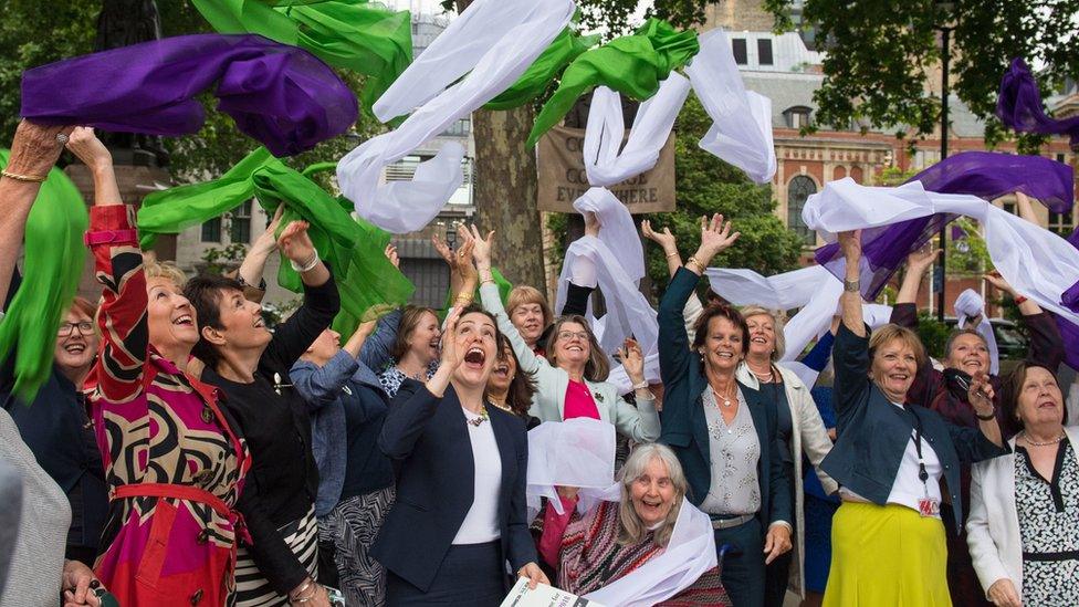 Female MPs including Leader of the House of Commons Andrea Leadsom (left) wearing suffragette colours