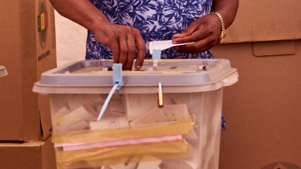 Voters arrive at a polling station to cast their votes as the election extends to a second day after long ballot delays, on August 24, 2023