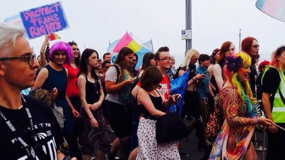 Trans Pride marchers make their way through the streets of Brighton