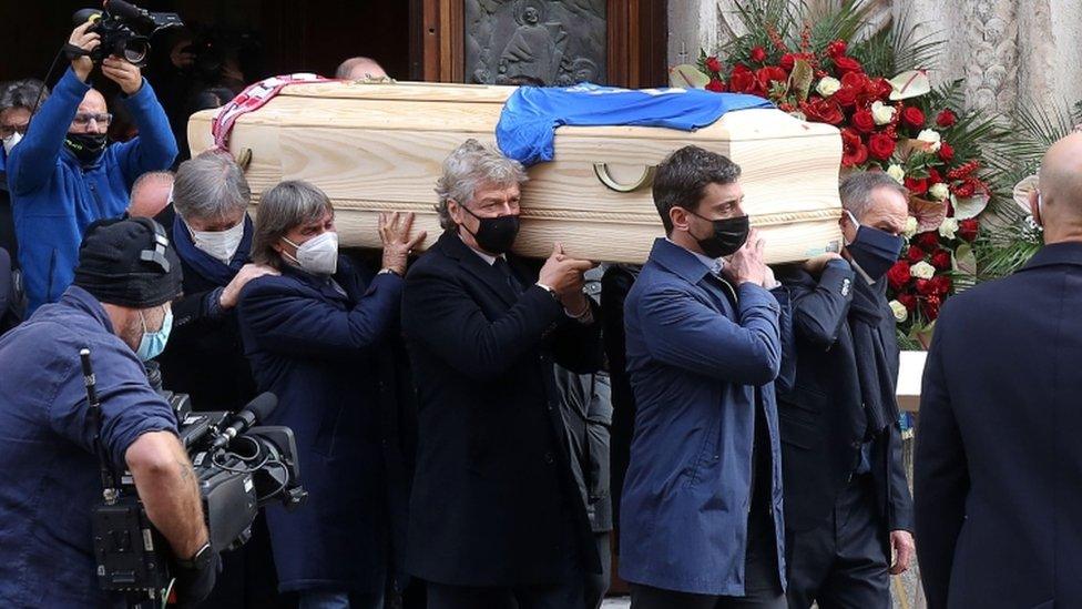 The coffin is carried out of the Santa Maria Annunciata Cathedral after the funeral mass for Paolo Rossi in Vicenza