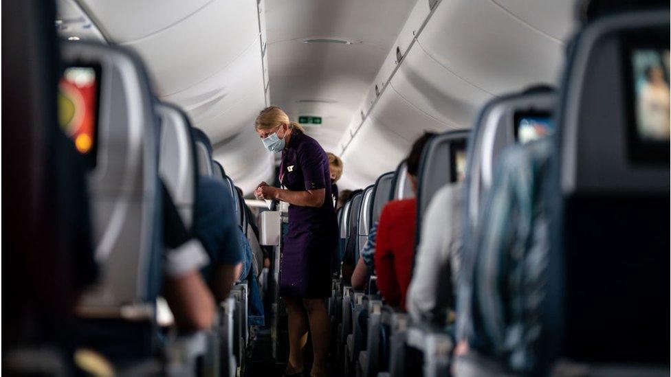 A Delta Airlines air hostess