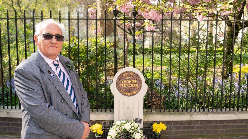 Retired police officer John Murray with flowers he laid at the memorial of PC Yvonne Fletcher