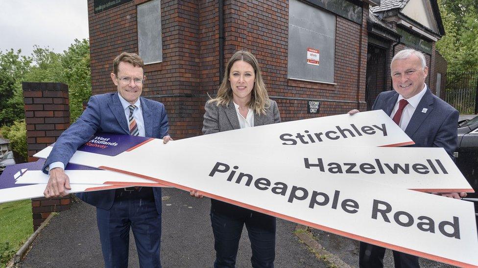 Mayor Andy Street, Kate Trevorrow (WMRE head of rail programme) and Cllr Ian Ward with the three proposed names outside the former railway station building