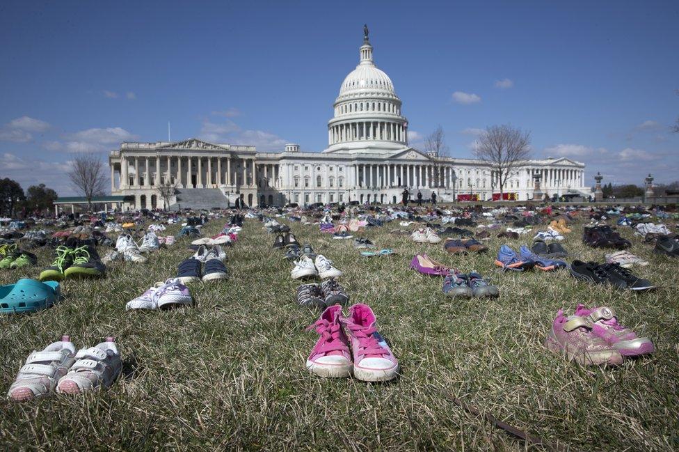 Approximately seven thousand pairs of shoes representing lost children to guns.