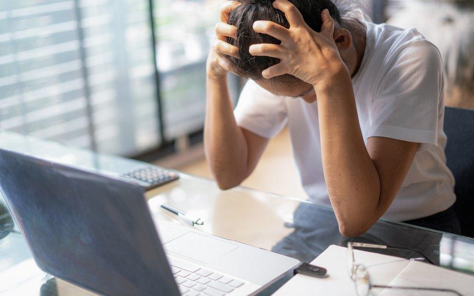 Stressed laptop user