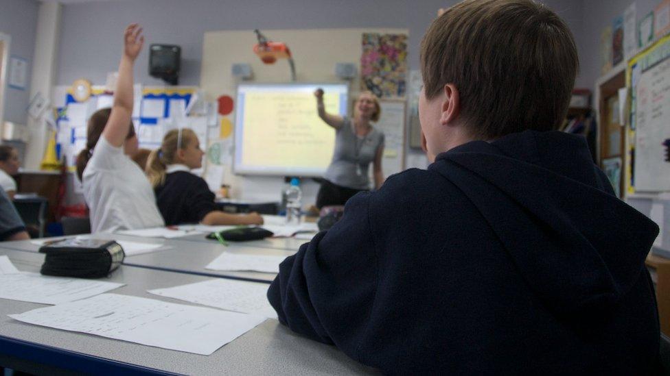 teacher in classroom