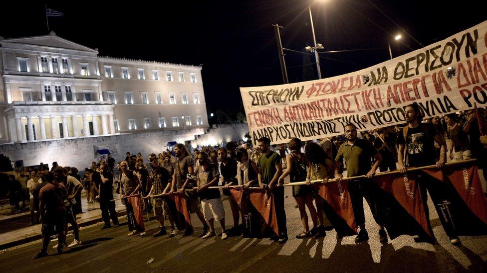 Protesters outside parliament in Athens on 22 July 2015