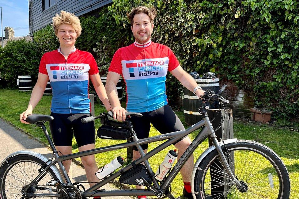 Luke and Elliot side by side with their tandem bike