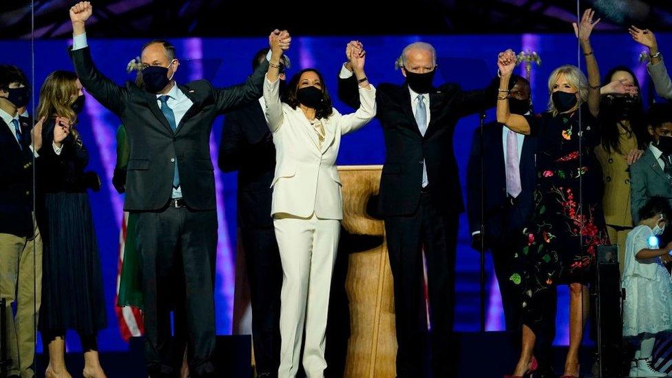 President-elect Joe Biden and Vice President-elect Kamala Harris, stand with their spouses, Dr. Jill Biden and Douglas Emhoff, after addressing the nation from the Chase Center November 07, 2020 in Wilmington, Delaware