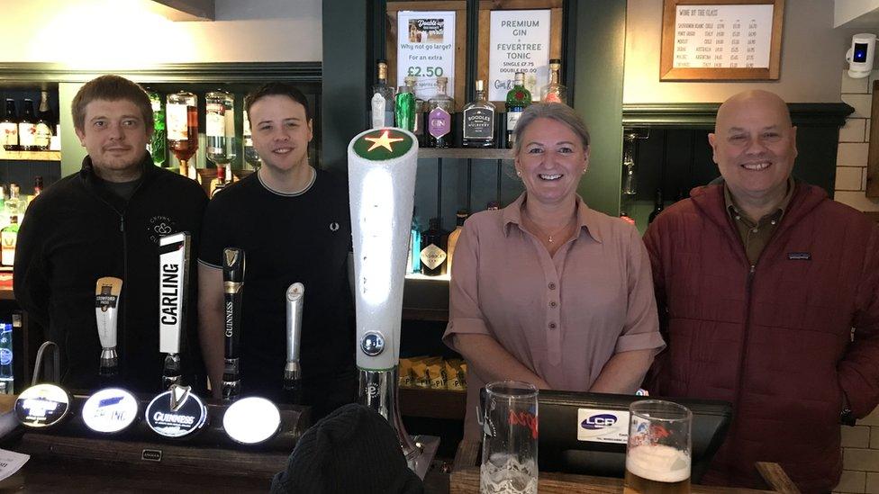 Bar and holiday cottage boss Kyle McRae (right) pictured in the Crown and Cushion at Appleby