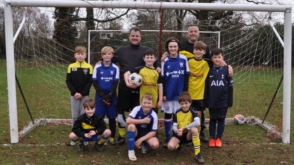 Sam Nunn with Holbrook Hornets under-10 squad members