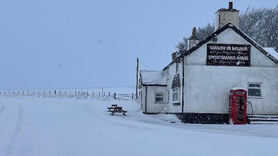 Snow covering the road near The Sportsmans Arms, near Cerrigydrudion, Conwy county