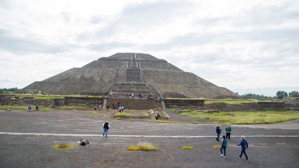 Tourists visit the archaeological site of Teotihuacan, one of Mexico's top tourist attractions, during its reopening amid the COVID-19 novel coronavirus pandemic on September 10, 2020