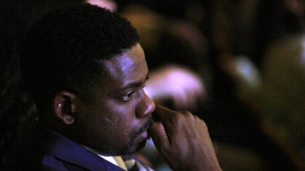 A member of the audience listens during at the NBC News - YouTube Democratic presidential candidates debate in Charleston, South Carolina 17 January 2016)