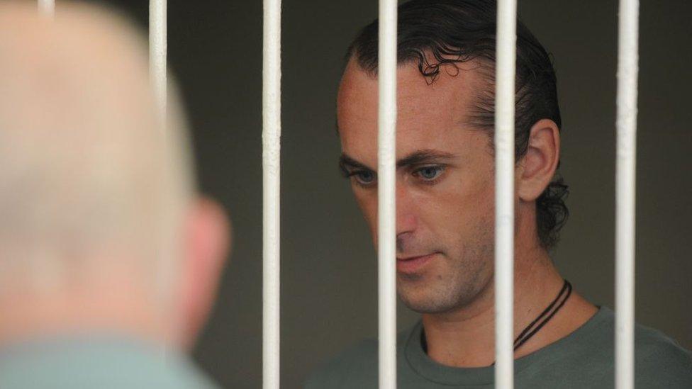 Britain national David Taylor waits for his trial in a holding cell in Denpasar on Indonesia's resort island of Bali on March 13, 2017