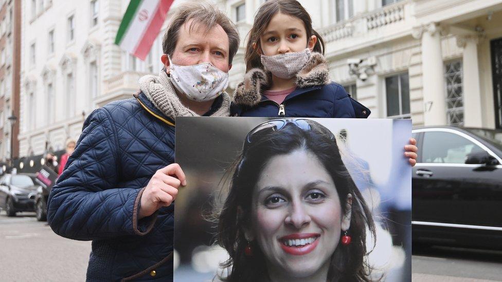 Richard Ratcliffe with his daughter Gabriella during a protest outside the Iranian Embassy in London