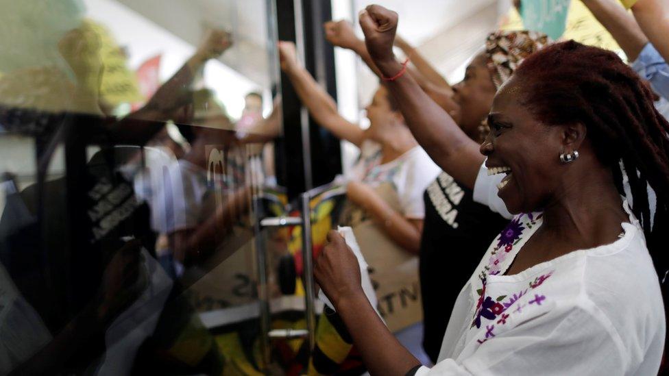 Demonstrators protest against statements that minimize racism in Brazil given by the new president of the Palmares Foundation on 28 November 2019