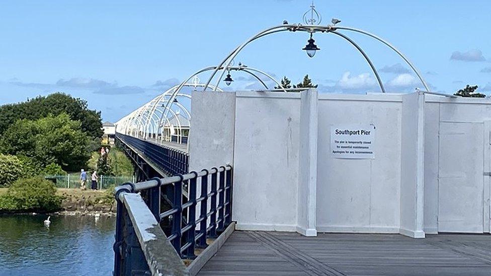 Southport Pier with boards across to show it's closed